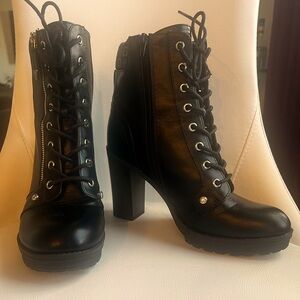 Guess size 9 and mid zipper boots!